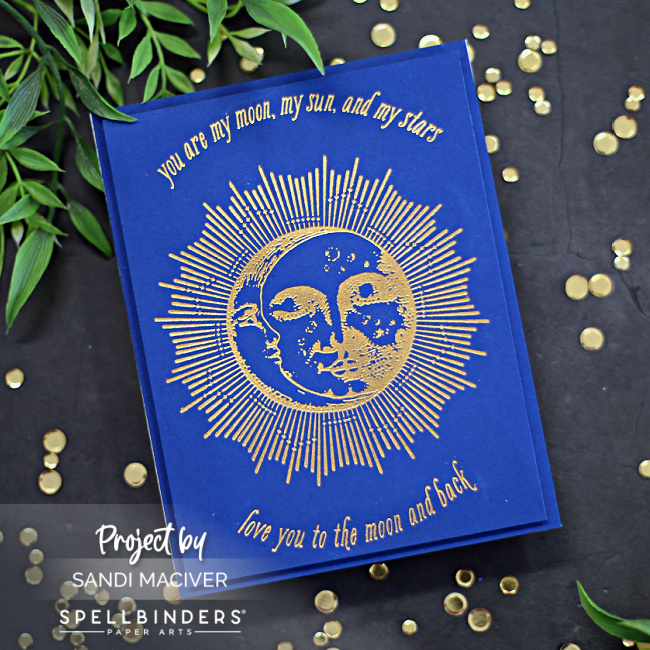 dark blue card with a gold embossed sun and moon created with new card making supplies from Spellbinders.