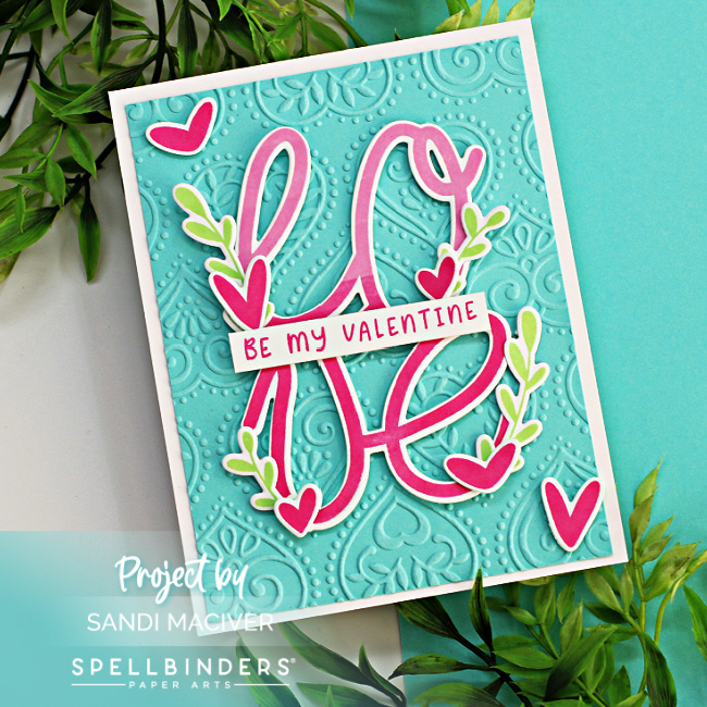 hand made valentine's card in teal and pink created with new card making supplies from Spellbinders