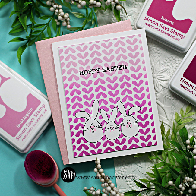 hand made easter card with three little bunnies and a heart design wallpaper background created with new card making supplies from Simon Says Stamp