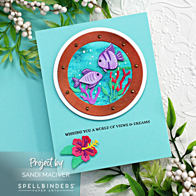 hand made card with a porthole showing little fish in an ocean scene, created with new card making supplies from Spellbinders