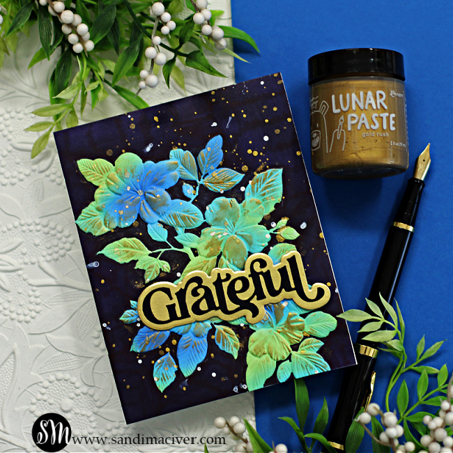 hand made greeting card with blue flowers and green leaves and a black background created with new card making supplies from Simon Says Stamp