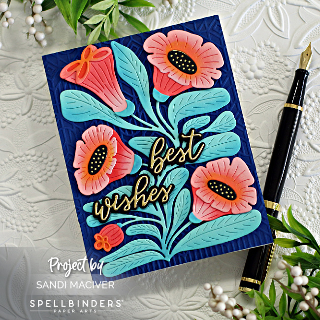 hand made card with a navy blue embossed background, teal blue leaves and orange flowers created with new card making supplies from Spellbinders 