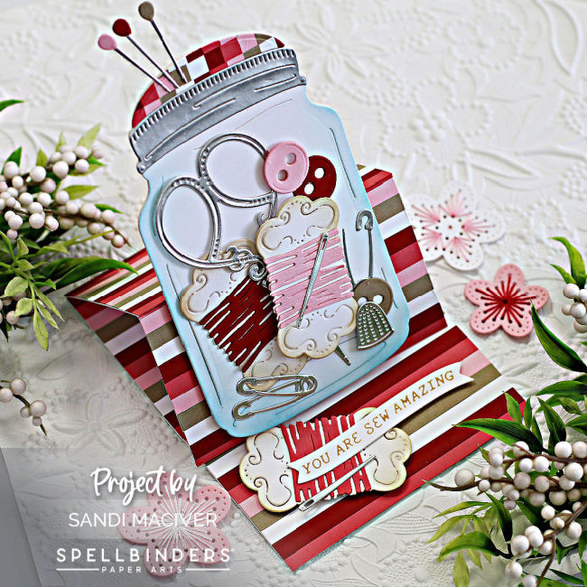 hand made easel card with a large die cut jar full of sewing notions created with new card making supplies from Spellbinders 