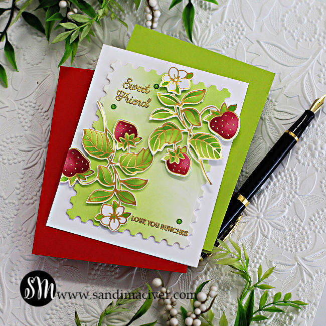 hand made greeting card with a postage label outline, and stenciled strawberries leaves and flowers created with new card making supplies from Spellbinders 