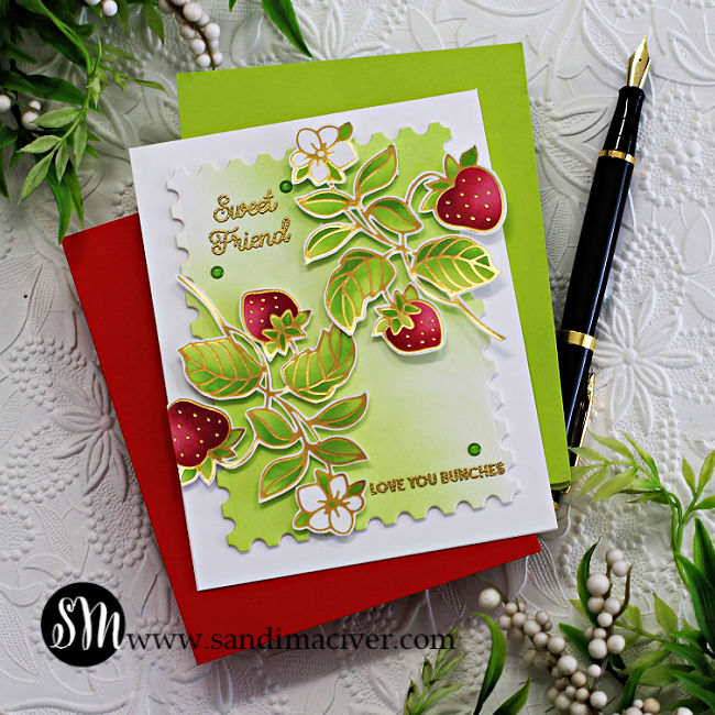 hand made greeting card with a postage label outline, and stenciled strawberries leaves and flowers created with new card making supplies from Spellbinders 