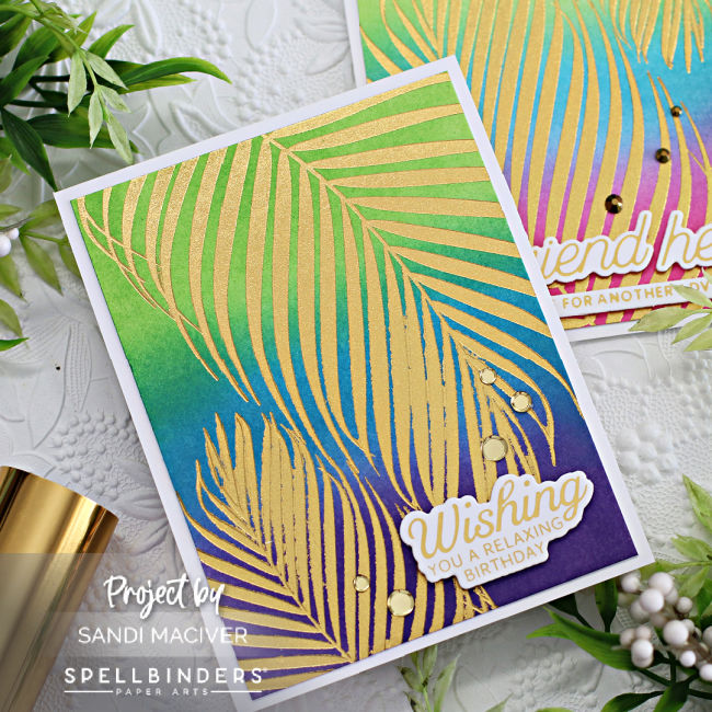 hand made cards with an ink blended background in purple blue and green and gold foiled palms created with new card making supplies from Spellbinders 