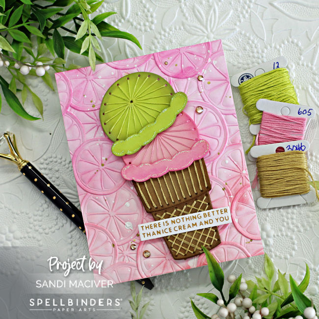 hand made card with an ice cream cone and pink and green stitched ice cream with a citrus embossed background created with card making products from Spellbinders 