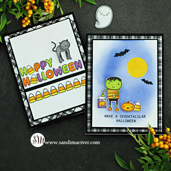 hand made Halloween card with a cartoon Frankenstein holding a goody bag, a little pumpkin and a big candy corn beside him on a purple background with a yellow moon and bats flying overhead.