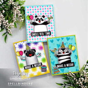 three hand made birthday cards with cartooned bear, pug and cat holding balloons and drinks with fun stenciled backgrounds