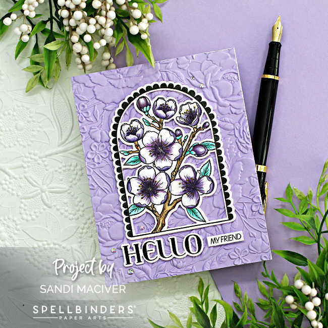 purple embossed hand made card with a center arch full of purple colored flowers