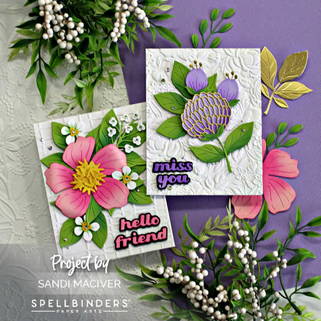 two hand made cards with white embossed backgrounds, the left card has a large pink flower the right card large purple flowers