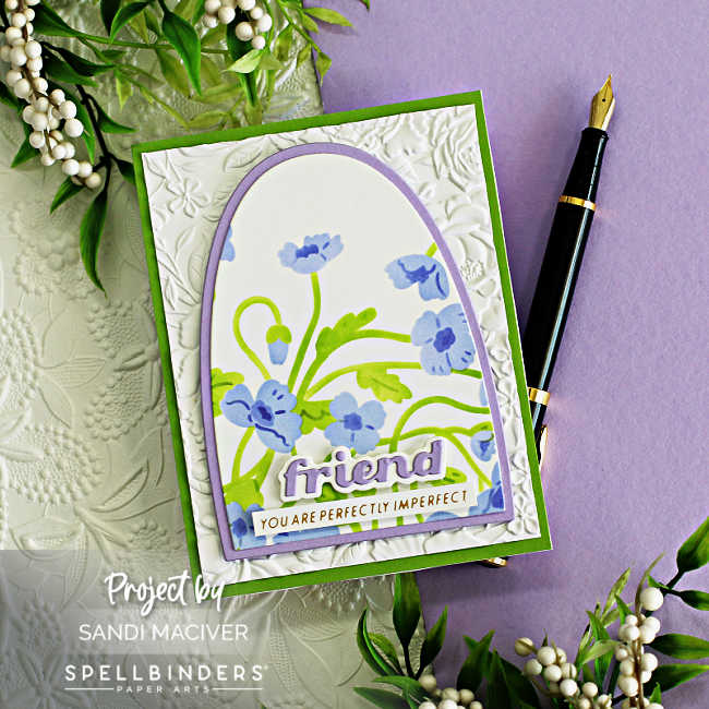 hand made purple and white card with stenciled purple flowers in an arch with a white flower embossed background