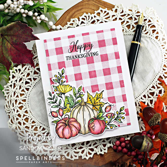 hand made fall card with a pink buffalo plaid background and a pumpkin garden scene with pink and white pumpkins