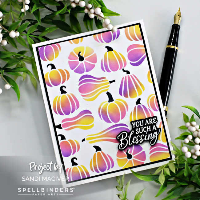 hand made cards with stenciled pumpkins in yellow pink and purple with a black and white sentiment.