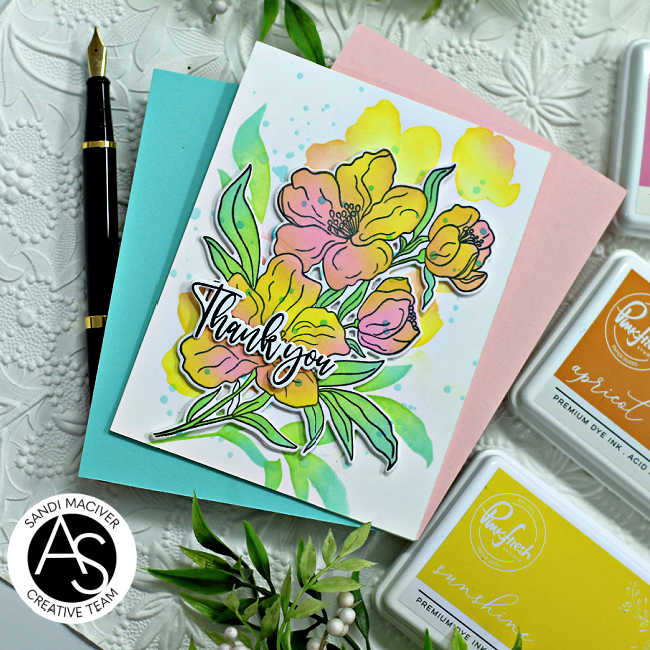 hand made thank you card with a stenciled bouquet of flowers in yellows pinks and oranges with greeny blue leaves 