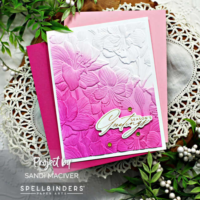 hand made christmas card with embossed Amaryllis flowers in pinks