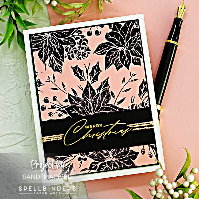 pink and black hand made Christmas card with a poinsettia and leaf design