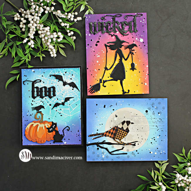 three hand made Halloween cards with die cut witches, pumpkins, bats and birds