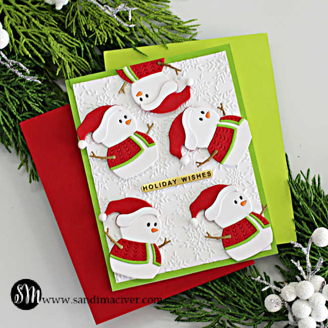 hand made christmas card with 5 die cut snowmen wearing a red and white santa suite