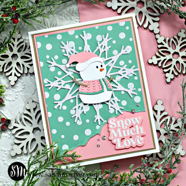 Mint Green and soft pink hand made cards featuring die cut snowflakes and tiny snowmen wearing pink and green sweaters and hats