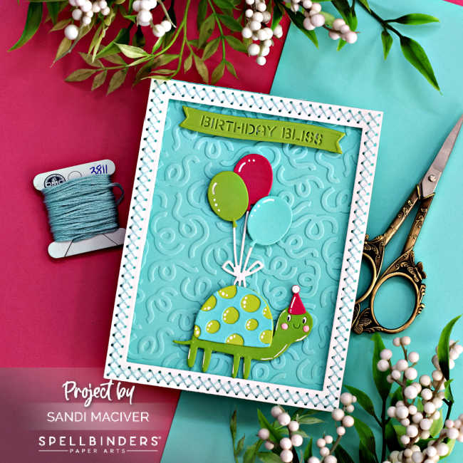 hand made childrens birthday card with a green and turquoise turtle holding balloons with a white stitched border