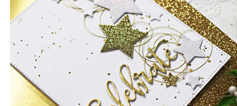 white card covered in gold and white glimmer stars down the right side and the word celebrate in gold