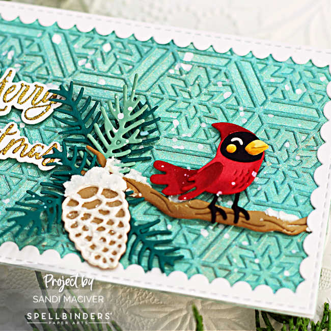 handmade slimline christmas card with two snow-covered branches with cardinals atop.