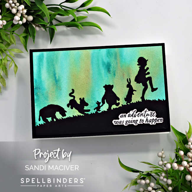 hand made card with a green and gold sky and a silhouette of winnie the pooh and friends holding hands off on an adventure