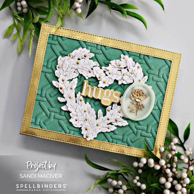 hand made mint colored valentine card with a gold frame, a white heart created from small white leaves, with gold berries, a gold sentiment in the center and a white wax seal with a gold rose in the center