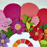 a rainbow of colored cardstock from spellbinders