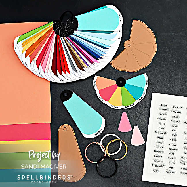 picture of cardstock swatches and dies in a rainbow of colors