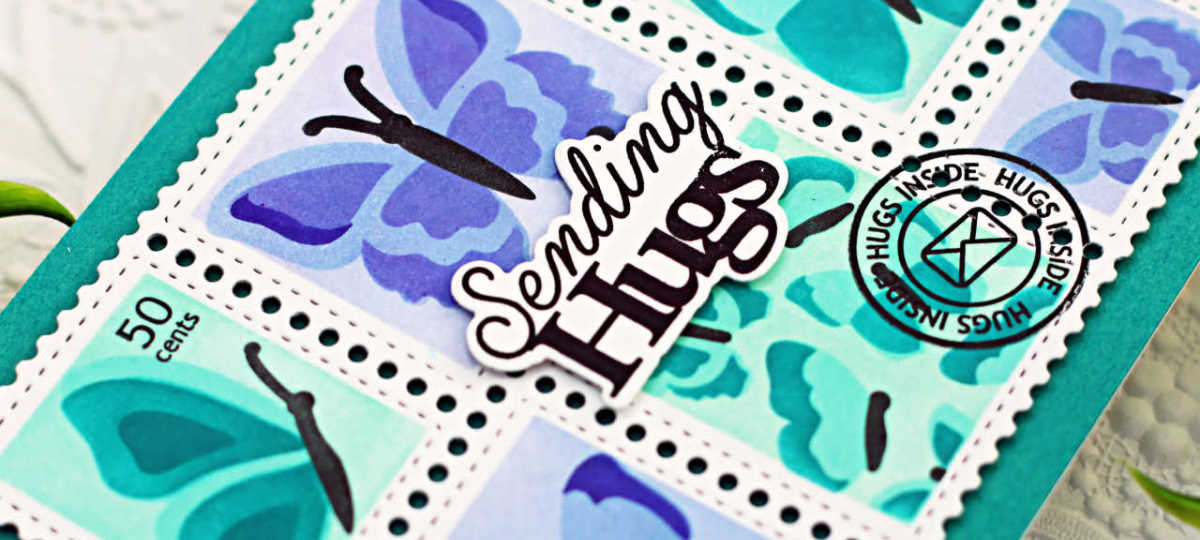 postage stamp style card with teal and purple butterflies and black cancelled stamp overlays on a teal background