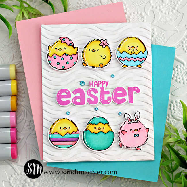 hand made white easter card with 6 colored and die cut chicks in eggs and a pink sentiment