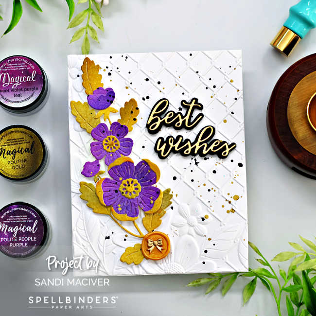 White embossed hand made card with purple flowers and gold leaves with a black and gold sentiment and a gold wax seal with a bow image