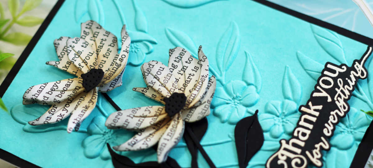 Handmade thank you card featuring Simon Says Stamp Tattered Daisy die set with layered text-print petals and black stems on a vibrant turquoise 3D floral embossed background. Finished with a bold white-on-black "Thank you for everything" sentiment. Elegant floral card design perfect for spring or gratitude-themed cardmaking.