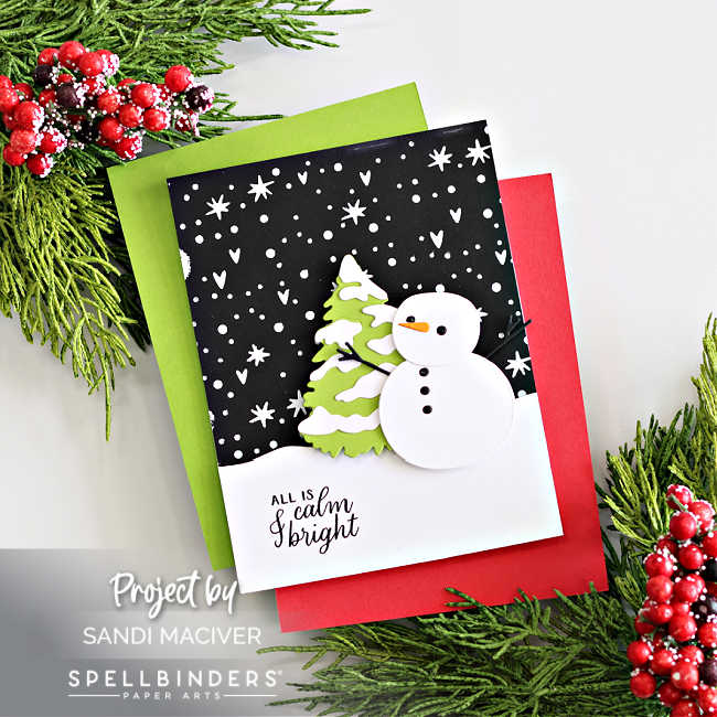 Handmade Christmas card created by Sandi MacIver featuring the Spellbinders October 2025 Small Die of the Month “Snow Day Friends.” The card showcases a layered white die-cut snowman and tree on a snowy black background hot foiled in white with the Magic Wonderland October Glimmer Club plate. The sentiment “All is calm & bright” from the To You and Yours October Clear Stamp and Die Set is stamped on a curved white snowbank. Clean and modern design in classic holiday colors with pops of lime green and red.