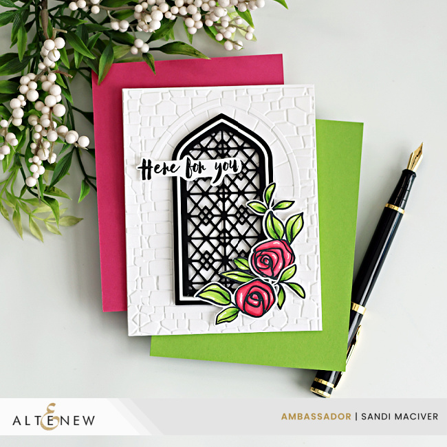 Handmade white A2 card featuring the Altenew Enchanted Castle Window 3D Embossing Folder and Gothic Arches Die Set, layered with a black lattice window over a stone-embossed background. A pink Bamboo Rose floral cluster with bright green leaves accents the lower right corner, and a “Here for you” sentiment is placed across the arch.