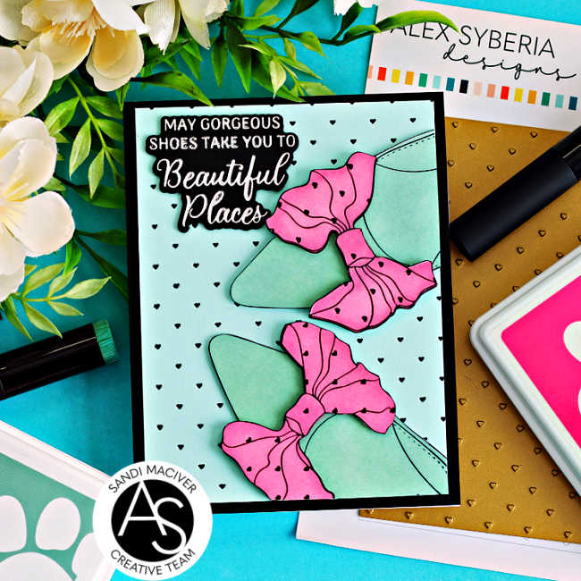 Handmade card featuring Alex Syberia Designs Bow Shoes BetterPress plates with seafoam green shoes and pink bows on a tiny black heart foiled background, finished with a silver foiled “May gorgeous shoes take you to beautiful places” sentiment.