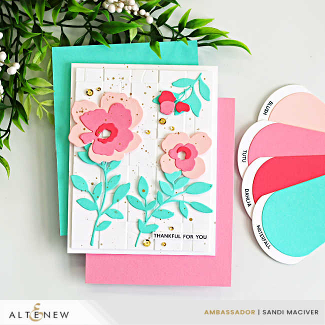 Blush and teal color combo for cardmaking with a layered floral handmade card, embossed white background, gold splatter, and coordinating cardstock swatches