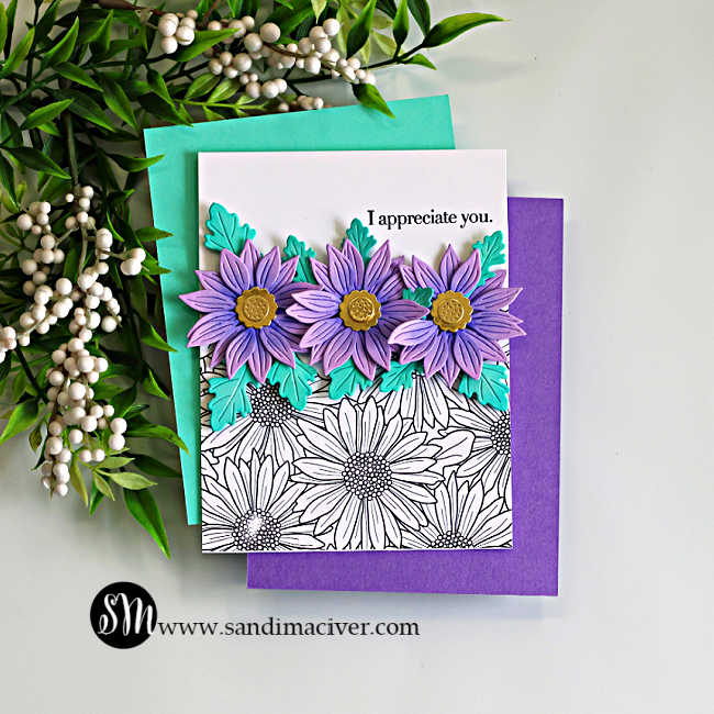 Floral die cut card with purple layered flowers and teal leaves on a white card front, featuring a stamped gerbera daisy background and “I appreciate you” sentiment, showcasing a clean and simple white space cardmaking design.