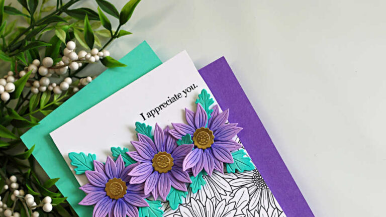 Easy floral die cut card featuring purple layered flowers and teal leaves on a clean white background, demonstrating how to embrace white space in cardmaking with a stamped gerbera daisy background and simple sentiment.