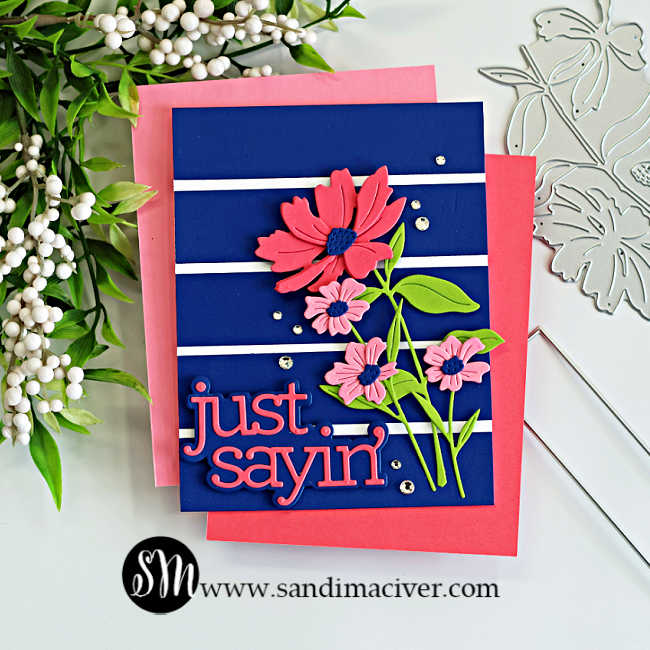 Bold navy cardmaking color combo featuring pink die cut flowers, bright green leaves, white stripe details, and a large “just sayin’” sentiment for a dramatic floral handmade card design.