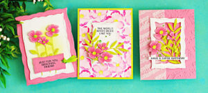 Poppy Song handmade die cut greeting cards featuring three floral card designs with layered flowers, stitched frames, and embossed backgrounds by Spellbinders