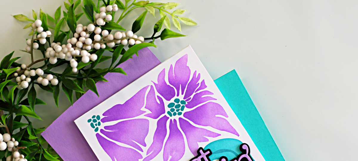 Simple ink blended floral card using the Friendly Blossoms stencil by Simon Says Stamp, featuring purple flowers and teal leaves on a clean white background.