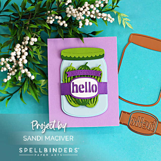 Die cut mason jar card featuring Spellbinders Market Jar Trio with layered pickle design, purple hello sentiment, and coordinating jar die pieces on a teal background