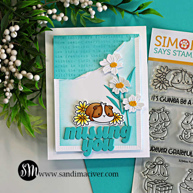 Handmade clean and simple “missing you” card featuring a cute guinea pig holding yellow flowers, layered white die cut daisies, soft Audrey Blue ink blending, torn paper texture, and subtle tone-on-tone background stamping using Simon Says Stamp products.
