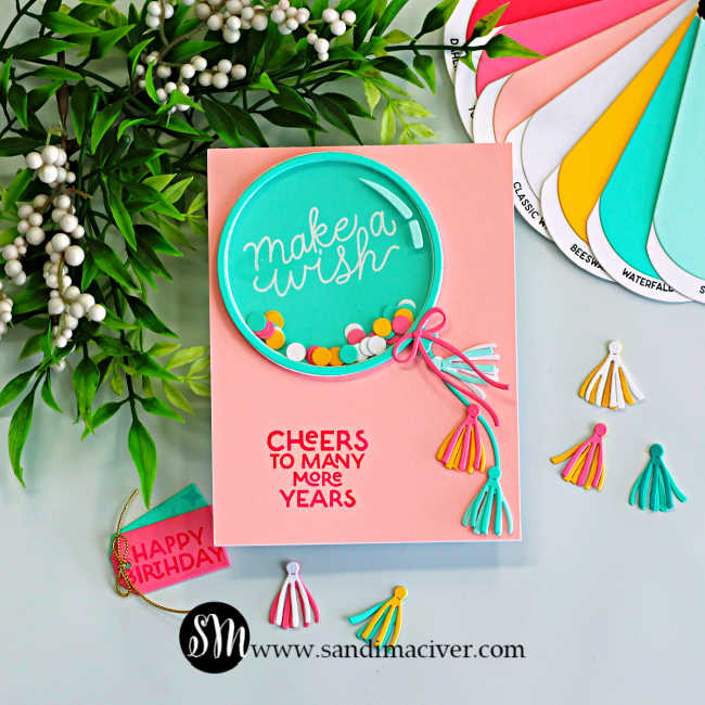 birthday balloon shaker card with teal balloon window, colorful confetti, tassel die cuts, and pastel cardstock from Hero Arts My Monthly Hero Kit