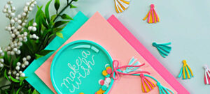 birthday balloon shaker card with pastel cardstock layers, teal shaker window, confetti pieces, and tassel die cut accents by Hero Arts My Monthly Hero Kit
