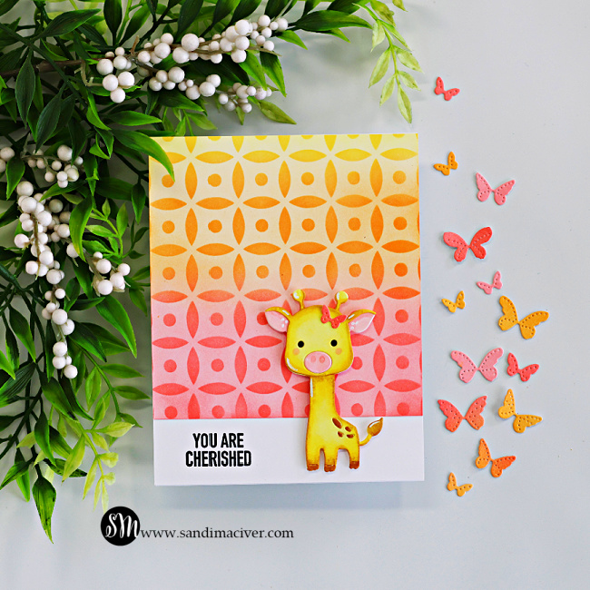 Handmade giraffe encouragement card featuring a yellow die-cut giraffe on a yellow, orange, and pink ink-blended Dot Petal Pattern stenciled background with colorful butterfly die cuts and a “You Are Cherished” sentiment.