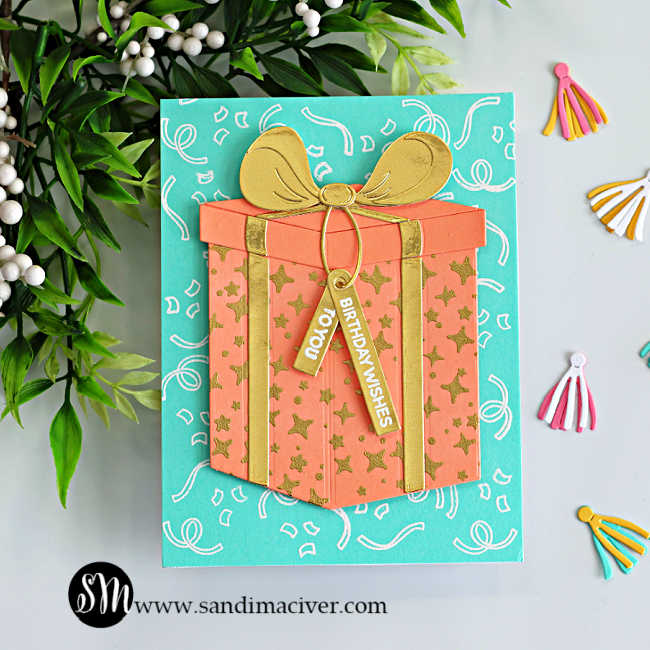 Easy die cut birthday card featuring the Hero Arts My Monthly Hero Big Present Die Set with a peach gift box, gold heat embossed stars, layered metallic gold bow and ribbon, white heat embossed sentiments, and a bright aqua confetti background.